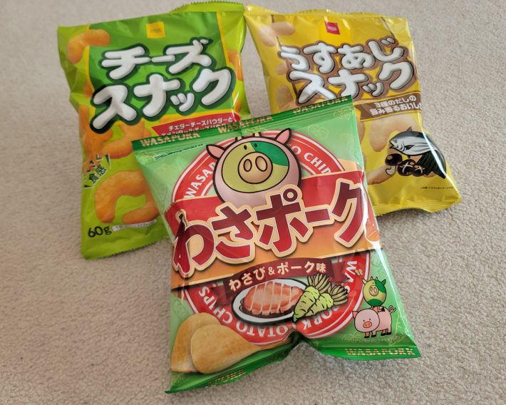 ベイシアチーズスナック　84円、ベイシアうすあじスナック　84円、わさポーク　95円