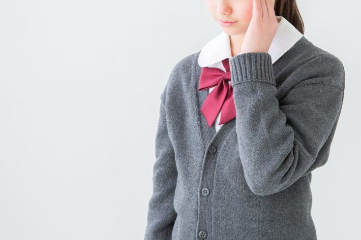 体調不良の女子高生