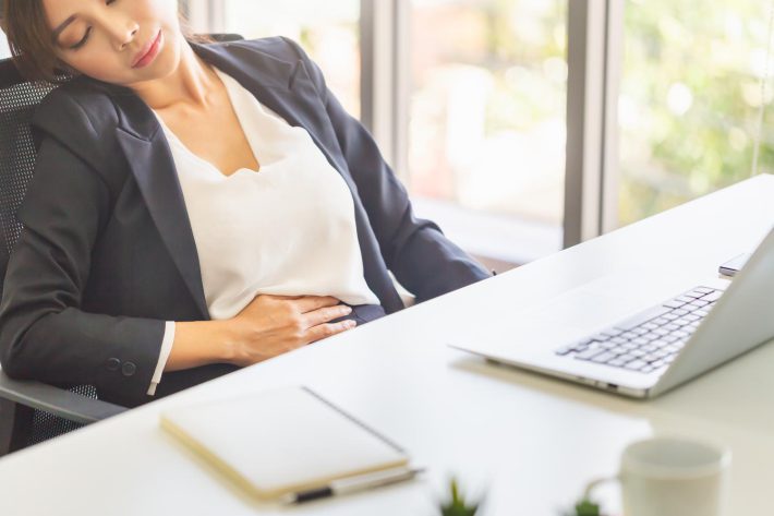 体調が悪そうな女性