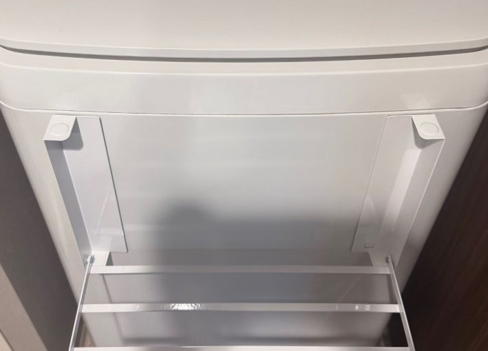 前面がカーブしている洗濯機でも取り付けられる