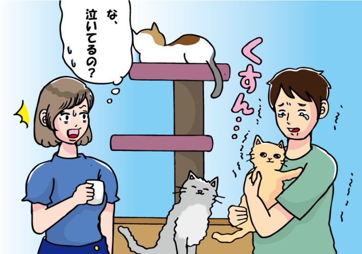 猫カフェデートで涙ぐむ男性